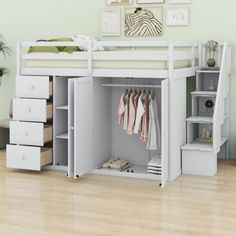 a white bunk bed with drawers underneath it