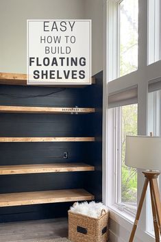 an empty shelf in the corner of a room next to a window with a sign that says easy how to build floating shelves