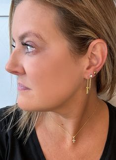 Introducing our 18k gold-plated Lock Drop Earrings - the perfect way to add a touch of boldness to your look. With an edgy design and lightweight feel, they're the ideal choice for anyone looking to make a statement that stands out from the rest. At just over an inch in length, these earrings are the perfect size to show off your daring side without being too overwhelming. Don't be afraid to stand out with these unique and stylish Lock Drop Earrings. Modern Linear Earrings With Adjustable Chain, Modern Gold Plated Earrings For Everyday Wear, Trendy Tarnish Resistant Drop Earrings, Modern Gold Plated Plug Earrings For Gift, Trendy Brass Earrings For Pierced Ears, Trendy Gold Plated Pierced Earrings, Chic Dangle Plug Earrings, Modern Gold Plated Pierced Earrings, Gold Modern Linear Earrings For Everyday