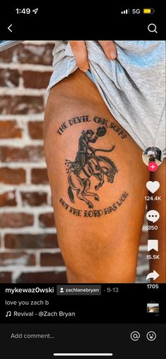 the back of a person's leg with tattoos on it and an image of a horse