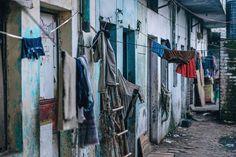 clothes hanging out to dry outside an old building