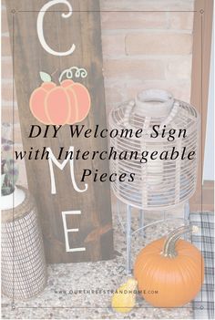 a welcome sign with interchangeable pieces and pumpkins on the ground next to it