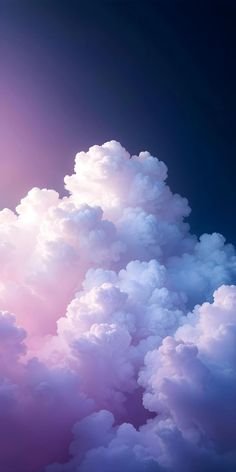 the sky is filled with white clouds and purple hues, as if it were painted in pastel colors