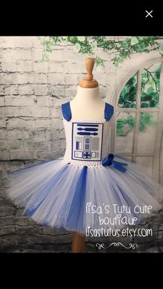 a dress made out of tulle with a blue and white star wars theme on it