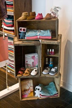 a wooden shelf with shoes and other items on it