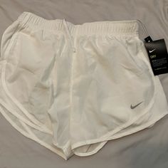 Brand New Nike Shorts Nike Summer Workout Shorts, Nike Beach Shorts With Stretch, Nike Beach Shorts, Nike Summer Sports Bottoms, Nike Bottoms For Beach And Spring Season, Nike Summer Beach Bottoms, Summer Nike Shorts, White Nike Bottoms For Beach, Nike Women Outfits