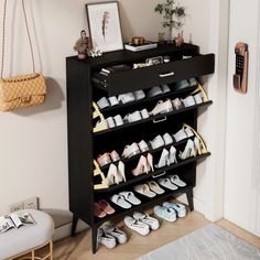 there is a shoe rack with many pairs of shoes on it