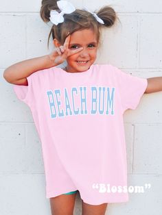 Dress your Little One trendy for Summer or Family Beach Vacation with this cute & comfy Beach Bum Kids Shirt! Youth Comfort Colors® Tshirts are super soft! Size up for a Trendy Oversized look! ♥ Hello and Welcome to Meaningful Tees Shop! ♥ Model is wearing Blossom ♥ All of our items are made one at a time with care for each customer : ) ♥ Please allow 5-7 BUSINESS days for your item to be created PLUS shipping time via USPS ♥ Printed on the highest quality Youth Tshirt, the Comfort Colors 9018 i Toddler Beach, Kids Beach, Trendy Kids, Kids Graphic Tees, Beach Kids, Family Beach, Beach Shirt, Beach Bum, Beach Shirts