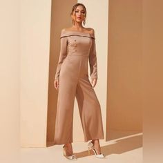 All Orders Ship By Next Business Day! Never Worn Off The Shoulder, Wide Leg, Button Detail Jumpsuit Color Is Nude/Tan Size Large Measurements* Underarm To Underarm: 19.5 In Neckline To Hemline: 53 In Waist: 16 In *Measurements Are Approximate Zipper Closure In The Back. 100% Polyester Very Cute For Various Special Occasions. Perfect For A Holiday Party. Smoke Free And Pet Free Home! Elegant Buttoned Jumpsuits And Rompers For Party, Elegant Long Sleeve Jumpsuits And Rompers With Button Closure, Formal Jumpsuits And Rompers With Button Closure, Spring Party Jumpsuits And Rompers With Button Closure, Off The Shoulder Jumpsuit, Shein Pants, A Holiday, Button Detail, Holiday Party