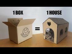 two cardboard boxes with one cat inside and the other in it's own house