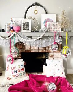 a living room with a fire place and decorations