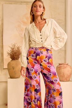 Casual and chic, our Palazzo pants are the ultimate statement pant to add to your wardrobe rotation. Designed in our much loved Ecovero Viscose Crepe which offers a soft hand-feel and drape, these pants are designed to sit high on the waist with a comfortable elasticated back waistband and dramatic wide-leg. The Palazzo is the ultimate pant to dress up with matching Jolie Blouse - Disco Dust for a statement set moment or with the Siren Top - Caramel. Julia wears size AU 8 and is 180cm. Sam (in s Chic Harem Pants For Vacation, Chic Viscose Pants For Vacation, Chic Wide-leg Viscose Pants, Fall Viscose Bottoms, Chic High-waisted Viscose Pants, Rayon Bottoms For Fall Day Out, Chic Ankle-length Harem Pants For Vacation, Chic Harem Pants For Spring Vacation, Fall Vacation Wide-leg Pants