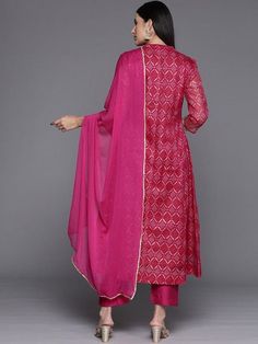 Grab this beautiful 3-piece set. The set comes with bandhani print & zari embroidery anarkali kurta has mandarin collar, 3/4th sleeves & calf length teamed with solid trouser pant with elasticated waistband & slip-on closure and a silk chiffon dupatta with lace detailing. Color - Pink Kurta Fabric-Cotton Blend Bottom Fabric-Silk Blend Dupatta Fabric - Silk Chiffon Neck-Mandarin Colar Sleeves-3/4th Sleeves Work - Bandhani Print & Zari Embroidery Washing Instructions-Hand Wash DISCLAIMER - The color of the product may be differ due to screen settings of device. A misprint here and a color drop slip there is the beauty of printing which is not treated as a defect. Embroidery Anarkali, Bandhani Print, Pink Kurta, Embroidered Anarkali, Zari Embroidery, Formal Jewelry, Anarkali Kurta, Chiffon Dupatta, Fabric Silk