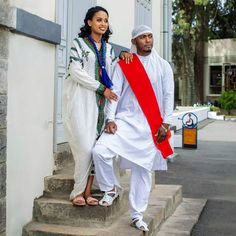 Ethiopian traditional clothing known as "habesha cloth" holds a unique and rich cultural significance. The habesha cloth is a vibrant reflection of the country's diverse heritage, representing the various ethnic groups and regions within Ethiopia. This description will delve into the intricacies of the couples' habesha cloth, focusing on its handwoven nature, intricate patterns, and the inclusion of the man's shoe, all while highlighting its significance. The habesha cloth is meticulously handwo Festive Habesha Kemis With Traditional Patterns, Festive Habesha Kemis For Traditional Ceremonies, Habesha Kemis For Traditional Ceremonies During Eid, Habesha Kemis For Eid With Traditional Patterns, Eid Habesha Kemis For Traditional Ceremonies, Traditional Agbada For Eid Ceremonial, Traditional Habesha Kemis For Ceremonial Occasions, Traditional Habesha Kemis For Ceremonies, White Habesha Kemis With Traditional Patterns For Ceremonies