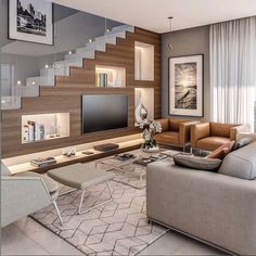 a living room filled with furniture and a flat screen tv mounted on a wall above a fireplace