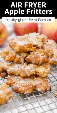 a stack of apple fritters sitting on top of a cooling rack