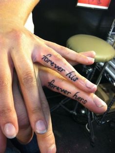 two people with tattoos on their hands and one has the words forever all i have