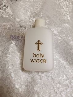 "Plastic bottle container for Holy Water, it is NOT sent with holy water, I'm only selling the container with gold letters text: (English) HOLY WATER (Spanish) AGUA BENDITA AVAILABLE IN ENGLISH OR SPANISH AS SHOWN, PLEASE SEE PICTURES. THANK YOU Dimensions: 4 1/2\" x 2 1/2\" x 3/4\" FINAL SALE! BY PURCHASING THIS LISTING, YOU AGREE TO HAVE READ ALL THE INFORMATION PERTAINING TO THIS ITEM, HAVE ASKED QUESTIONS IF, YOU HAD ANY. THANK YOU." Holy Water Drink, Water Plastic Bottle, Christian Water Bottles, Bible Verse Water Bottle, Text English, Spn Dr, Water Baptism, Bottle Container, Water Time