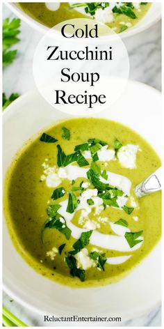 two white bowls filled with soup and topped with parmesan cheese, cilantro and green herbs