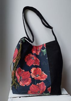 A unique bag decorated with floral ornament !
A beautiful addition to your boho bags collection !

Very capacious, shapely bag that easily fits A4 format folder.
Bag made of and vegan suede.
Inside the bag will find a lining with two pockets.
The entire bag closed with a zipper.
Adjustable strap

Bag dimensions:

Width 14,57 - 15,75 in / 37- 40 cm
Height 15,75 in / 40 cm Tote Hobo Bag With Adjustable Strap As Gift, Hobo Tote Bag With Adjustable Strap As Gift, Rectangular Hobo Bag With Adjustable Strap As Gift, Gift Hobo Tote Bag With Adjustable Strap, Handmade Hobo Crossbody Bag For Gifts, Handmade Crossbody Hobo Bag As Gift, Handmade Hobo Crossbody Bag As Gift, Artistic Handmade Bag For Everyday Use, Artistic Red Bags For Everyday Use