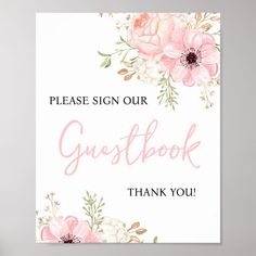 a sign that says, please sign our guestbook thank you with pink flowers and greenery