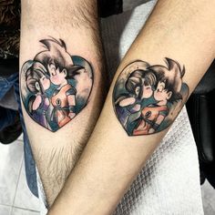 two people with tattoos on their arms, one is holding the other's arm