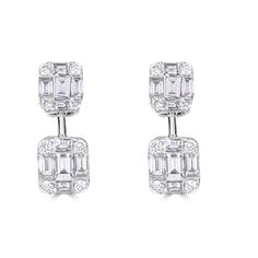 These dazzling 18kt white gold drop earrings showcase 0.90cts of round and emerald cut diamonds, expertly set to create the look of much larger stones. Handcrafted in Italy by ZYDO Italian Jewelry. *These earrings are made to order. Please allow 4-6 weeks for shipping. Diamond Quality: Color F, Clarity VSDiamond Carat Weight: 0.9Dimension: 1/2 in. x 3/16 in. White Gold Drop Earrings, Set Earrings, Italian Jewelry, Classic Chic, Emerald Cut Diamonds, Pendant Rings, Gold Drop Earrings, Ring Collections, Round Earrings