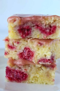 two pieces of cake sitting on top of a white plate