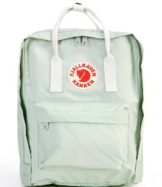 From Fjallraven&#x2C; the Patch Logo Kanken Water-Resistant Cotton Zipper Convertible Backpack features:Durable water-resistant cotton vinylon fabricZipper closureRemovable seat padFront and side pocketsZip pocket outsideDouble convertible straps for bag or backpack wearApprox. 14.9" x 10.6" x 5.1" bag; 14.9" strap lengthVolume approx. 16 LImported. Mochila Fjallraven Kanken, Cute Backpacks For School, Water Resistant Backpack, Church Camp, Green School, Trendy Backpacks, Back To School Backpacks, Backpack For Teens, Closet Organizer