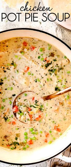 a bowl of chicken pot pie soup with a spoon in it and the words chicken pot pie soup above it