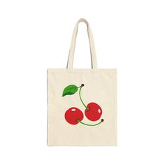 This sweet 100% cotton bag is 15" x 16," perfect for everyday wear. It's durable and will last for years. The bag features 20-inch canvas handles, making it easy to carry even with a week's worth of delicious cherries! Eco-friendly Red Cotton Canvas Bag, Retro Cotton Canvas Shopping Bag, Retro Red Cotton Bag, Tote Bag Design Ideas, Bag Design Ideas, Best Tote Bags, Painted Tote, Girls Tote, Gift Inspo