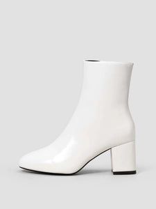 White Leather Ankle Booties White Pointed Toe Platform Boots For Fall, White Pointed Toe Platform Boots In Faux Leather, White Pointed Toe Platform Boots, White Leather High-top Mid-calf Boots, White High-top Leather Mid-calf Boots, Spring High-top White Platform Boots, White High-top Platform Boots For Spring, White Leather Platform Boots With Pointed Toe, White Faux Leather Platform Boots