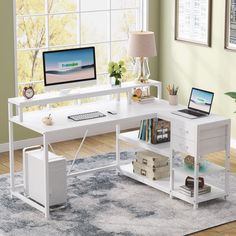 a white computer desk sitting on top of a wooden floor