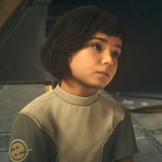 a young boy in a star trek uniform