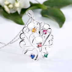 Customize your blessings for the loved ones you feel truly connected to.Stunning and elegant, this necklace makes an adorable gift for Mom, wife, children or yourself. Family tree is a popular and meaningful motif in jewelry. It always related to best wishes for loved one. This necklace features a dancing tree with five birthstones. You can customize at most five names on the leaves. Chain Type: Weight: 2.95 gWidth: 23.46 mmHeight: 30.85 mmThickness: 4.14 mmMaterial: Plating Color: SilverLength: Dancer Necklace, Tree Of Life Pendant, Tree Pendant, Gemstone Necklace Pendant, Trendy Wedding, Family Tree, Gemstone Colors, Quality Jewelry, Gemstone Pendant