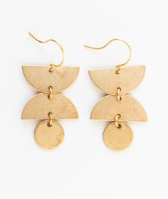 "A little pair of dainty geometric earrings made with small geometric shapes in golden brass. DETAILS: Brass geometric shapes 24K gold plated ear wires 1.5\" long Handmade by Nest Pretty Things in our Burlington Vermont studio. Ships in a gift box." Burlington Vermont, Burlington Vt, Minimalist Earrings Gold, Gold Triangle, Cameo Earrings, Earrings Geometric, Earrings Simple, Triangle Earrings, Earrings Minimalist