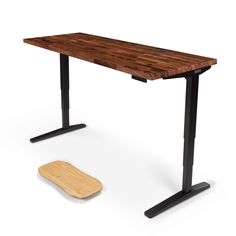 an electric standing desk with a wooden board underneath it