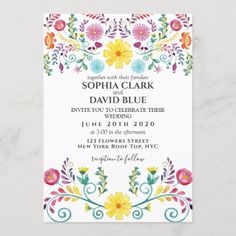 an ornate floral wedding card with colorful flowers