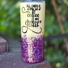 a purple and white glitter tumbler with the words all i need is coffee and jesus on it