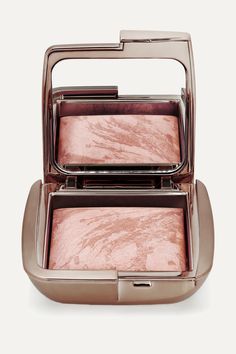 Give your skin a healthy, sun-kissed glow with Hourglass' illuminating bronzer. The revolutionary powder formula is hand-mixed to create the perfect balance of pigments, meaning no two compacts look exactly alike. Infused with a pale-pink highlighter for a candlelit glow, this flattering tan shade is easy to blend and layer for a natural-looking, radiant finish.   - Suitable for fair to light complexions - Medium tan shade with warm undertones - Also available in: ['Radiant Bronze Light' id62172 Hourglass Ambient Lighting Powder Luminous Light, Hourglass Ambient Lighting Blush Sublime Flush, Hourglass Highlighter, Hourglass Ambient, Best Bronzer, Best Self Tanner, Pink Highlights, Bronze Lighting, Makeup Bronzer