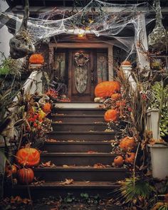 an entrance to a house decorated for halloween