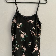 Black Floral Top With Lace Trim From Ootdfash, Never Worn. Material Is Kind Of See Through, Comes With Adjustable Straps. Willing To Make Offers And Bundles:) Black Camisole For Spring Loungewear, Black Floral Print Cami Tops, Casual Black Camisole For Loungewear, Black Floral Print Spaghetti Strap Tops, Black Summer Camisole For Loungewear, Black Spaghetti Strap Camisole For Spring, Top With Lace Trim, Boutique Couture, Black Floral Top