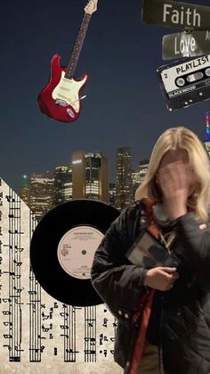 a woman standing in front of a city skyline with an electric guitar flying over her head