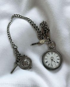 Vintage Silver Pocket Watch With Metal Dial, Vintage Silver Pocket Watch With Chain, Vintage Silver Pocket Watch For Wedding, Silver Pocket Watch Metal Dial Gift, Silver Pocket Watch With Metal Dial As Gift, Silver Pocket Watch With Metal Dial For Gift, Vintage Silver Engraved Pocket Watch, Formal Silver Pocket Watch With Locket, Silver Pocket Watch With Locket For Formal Occasions