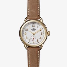 This Shinola Runabout Ladies watch is designed with a white dial and tan leather strap. Powered by quartz movement, this beautiful watch evokes both power and prestige. Timeless Yellow Gold Analog Watch, Timeless Everyday Watch With Round Dial, Timeless Yellow Gold Analog Watch Accessories, Timeless Round Dial Watch For Workwear, Timeless Everyday Watches With Polished Finish, Everyday Timeless Watch With Polished Finish, Timeless Polished Finish Watches For Work, Womans Watches, Shinola Watch