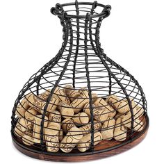 a wire basket filled with wine corks