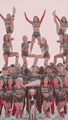 a group of cheerleaders posing for a photo