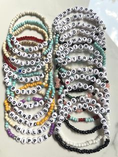 Perfect to wear to that Lainey Wilson concert, county fairs and summer bbq's. Set of 2 friendship style bracelets.  Sets to Choose from: Wild Horses WildFlowers Atta Girl Lainey Watermelon  Moonshine  Bell Bottom Country ❤️ Like a Truck Dreams & Gasoline Hillbilly Hippie Lainey Wilson Countrys  Cool Again Hold My Halo Drunk Tornado  Straight Up Sideways Bracelets made with glass seed beads and accented with glass rondelle beads and acrylic letter beads.  Bracelets made to 7 inches in length. Ple Stackable Casual Beaded Bracelets For Summer, Casual Stackable Beaded Bracelets For Summer, Adjustable Letter Beads Jewelry For Spring, Casual Stackable Summer Jewelry, Bohemian Jewelry With Letter Beads For Spring, Spring Bohemian Jewelry With Letter Beads, Fun Festival Bracelets, Adjustable, Personalized Festival Jewelry With Round Beads, Personalized Round Beads Jewelry For Festival