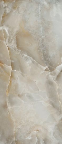 an image of marble textured in white and beige