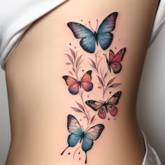 a woman's stomach with butterflies on it